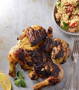 Lemon and herb chicken spatchcock served with a minty couscous